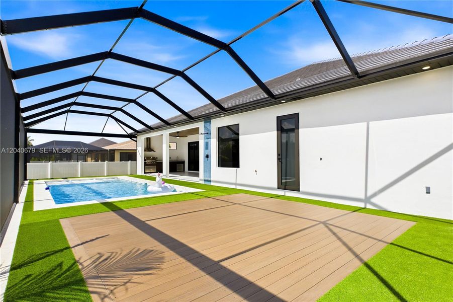 Expansive pool deck offers plenty of space for lounging, entertaining, and soaking up the SWFL sunshine