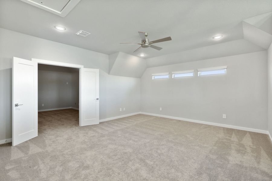 Game Room in the Henley home plan by Trophy Signature Homes – REPRESENTATIVE PHOTO Game Room in the Henley home plan by Trophy Signature Homes – REPRESENTATIVE PHOTO