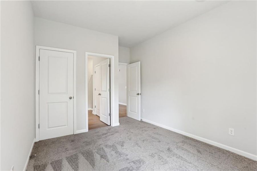 Spacious, unfurnished interior of a new home in The Hills at Cedar Creek, Winder (Image 32).