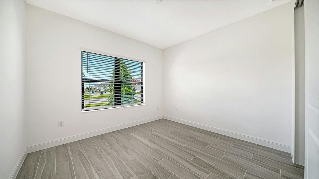 Spacious, unfurnished interior of a new home in Windward Real Estate and Homes for Sale in Sarasota, FL - Neal Communities, Lakewood Ranch (Image 34).