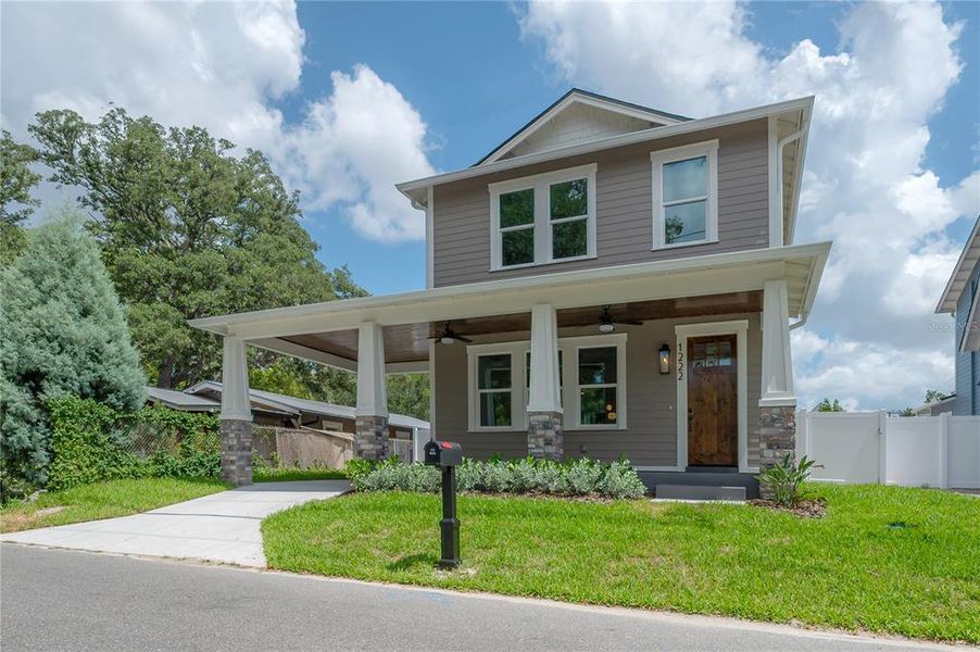Front exterior of a new home in , Tampa, FL, highlighting curb appeal (Image 29). Front exterior of a new home in , Tampa, FL, highlighting curb appeal (Image 29).