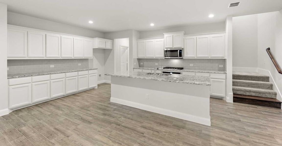 Representative exterior photo of a completed home built from the Thornbury by Impression Homes in Still Water Lake, Godley, TX (Image 8). Representative exterior photo of a completed home built from the Thornbury by Impression Homes in Still Water Lake, Godley, TX (Image 8).