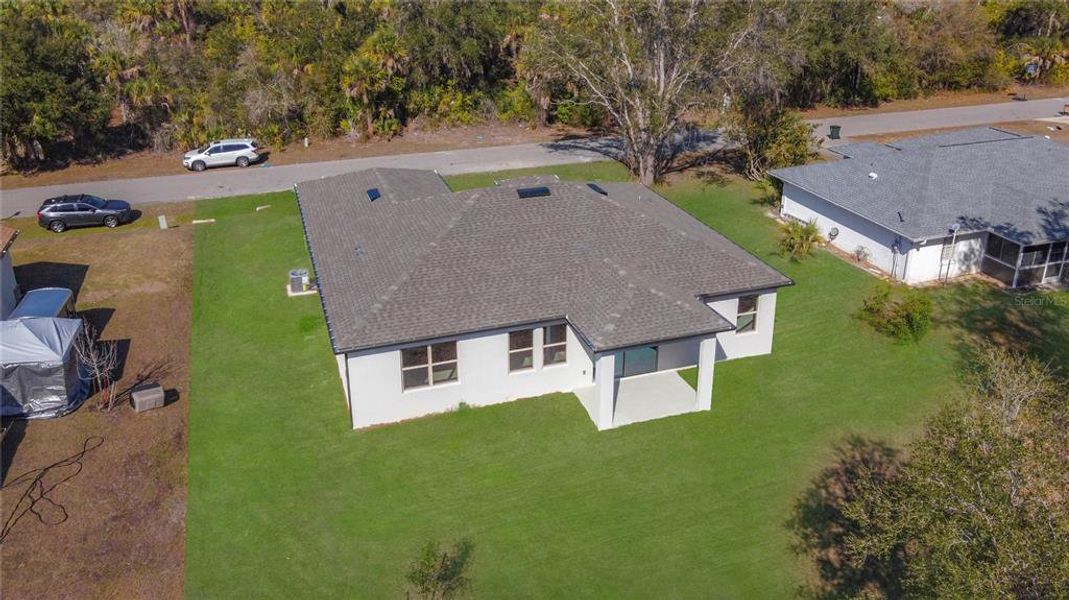 Exterior details and patio area of a home in , North Port (Image 28).