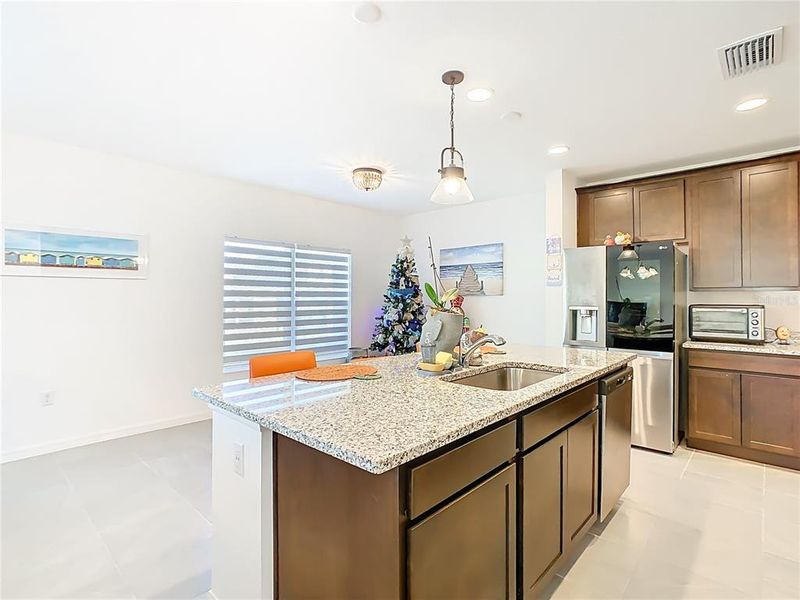 Furnished interior view inside a new home in Horse Creek at Crosswinds, Davenport (Image 5).