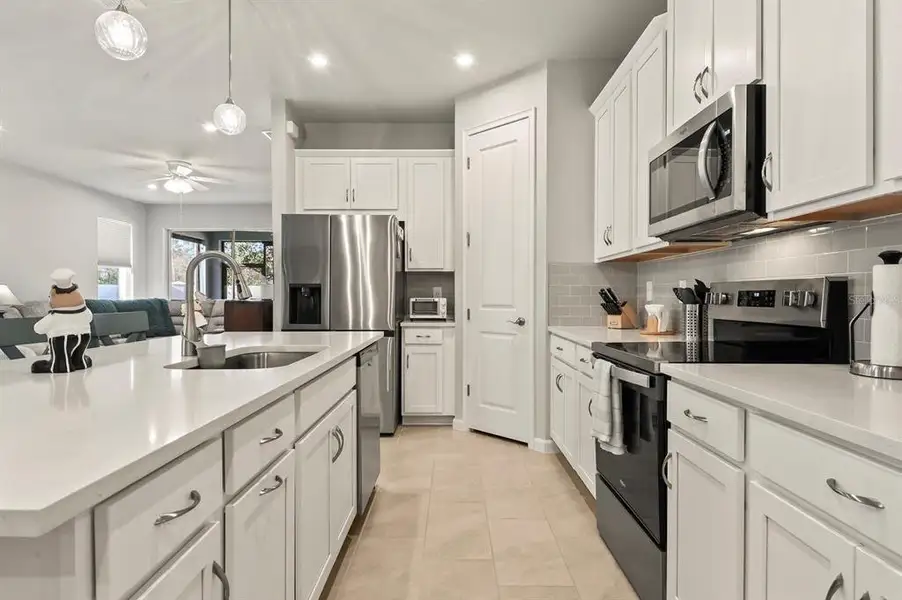 Furnished interior view inside a new home in , Sun City Center (Image 5). Furnished interior view inside a new home in , Sun City Center (Image 5).