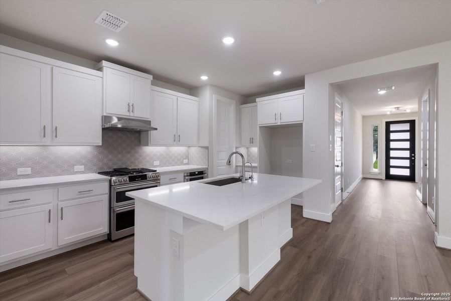 Furnished interior view inside a new home in Crown Ridge Manor, San Antonio (Image 5).