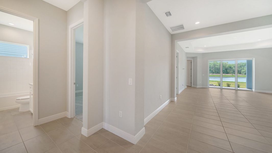 Spacious, unfurnished interior of a new home in Wildleaf at North River Ranch, Parrish (Image 13).