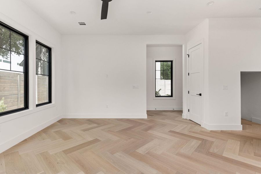 Unfurnished room featuring ceiling fan and baseboards Unfurnished room featuring ceiling fan and baseboards