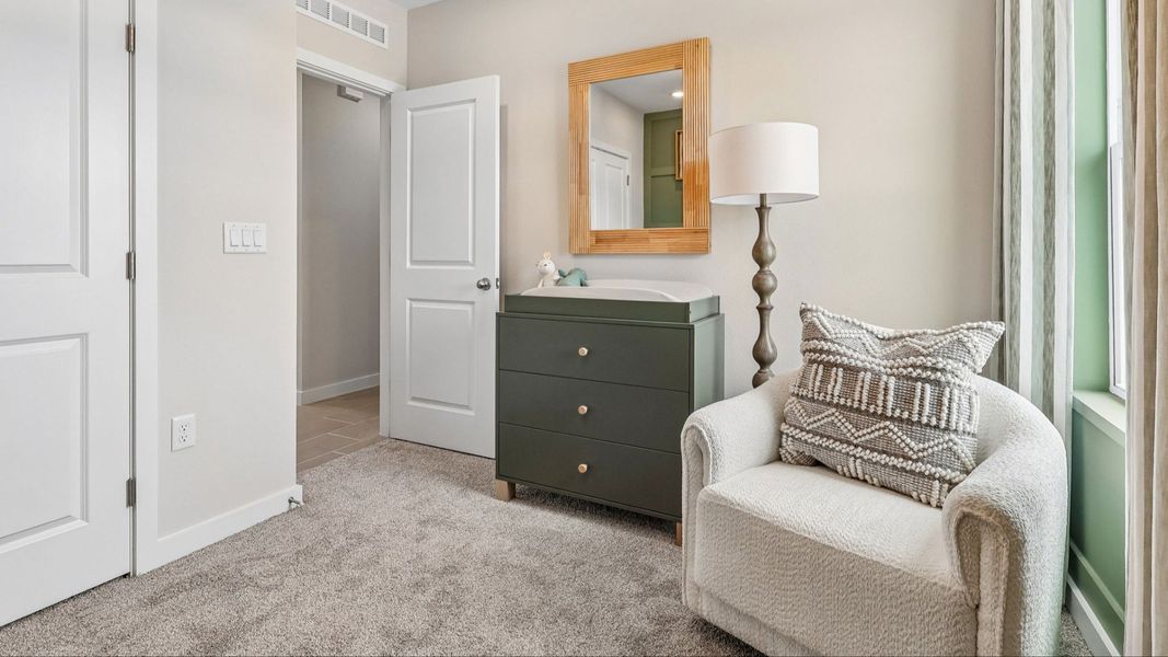 Flagler Floor Plan Secondary Bedroom staged as a nursery Flagler Floor Plan Secondary Bedroom staged as a nursery
