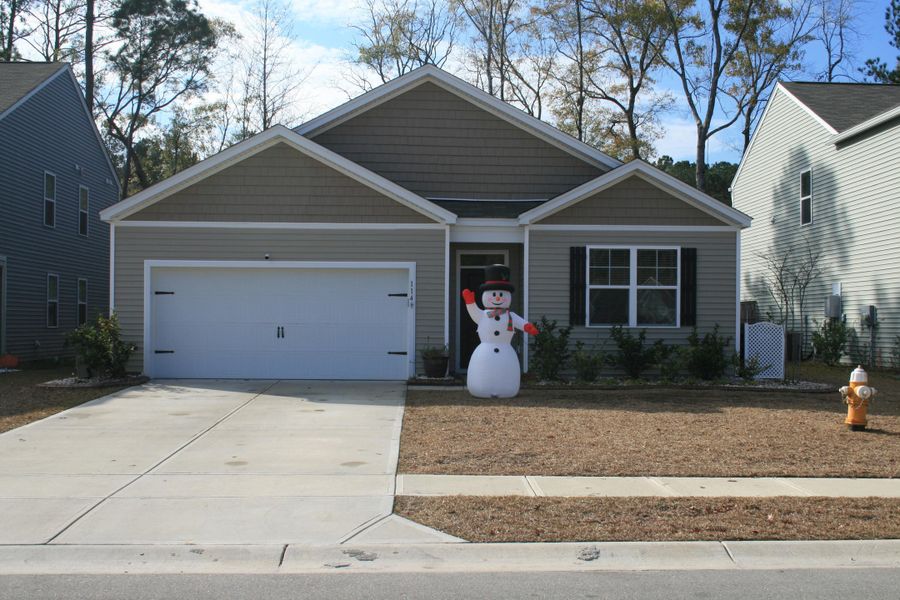 Front exterior of a new home in Reserve at Mallard Crossing, Summerville, SC, highlighting curb appeal (Image 1). Front exterior of a new home in Reserve at Mallard Crossing, Summerville, SC, highlighting curb appeal (Image 1).