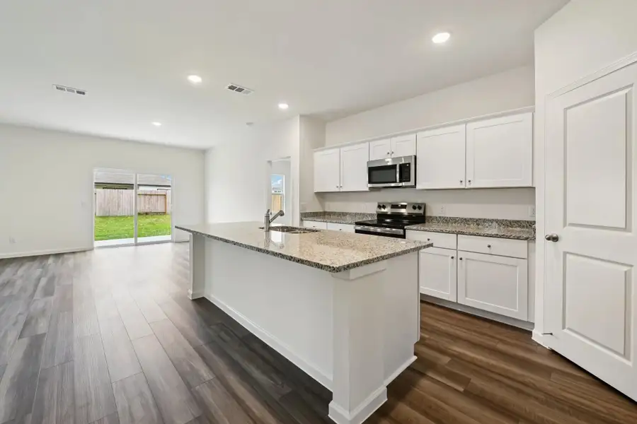 Representative furnished interior of a home built from the Firefly by Starlight Homes in Cottonwood Creek, San Marcos (Image 9).