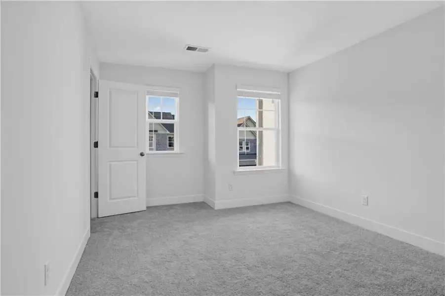 Spacious, unfurnished interior of a new home in Towns at Holly Springs, Holly Springs (Image 24).