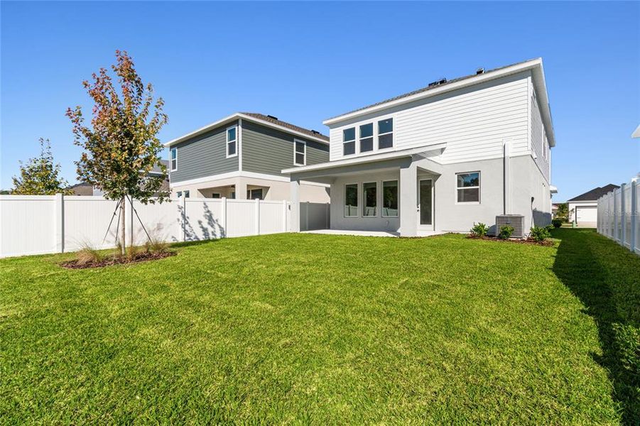 Exterior details and patio area of a home in Persimmon Park - Garden Series, Wesley Chapel (Image 24).