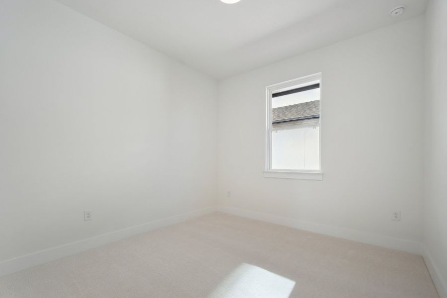 Spacious, unfurnished interior of a new home in Koenig Townhomes, Austin (Image 30).