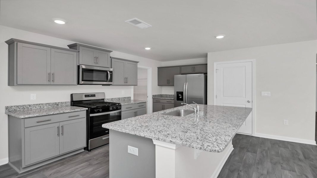 Representative furnished interior of a home built from the ROBIE by D.R. Horton in Ferry Grove, Lexington (Image 5).