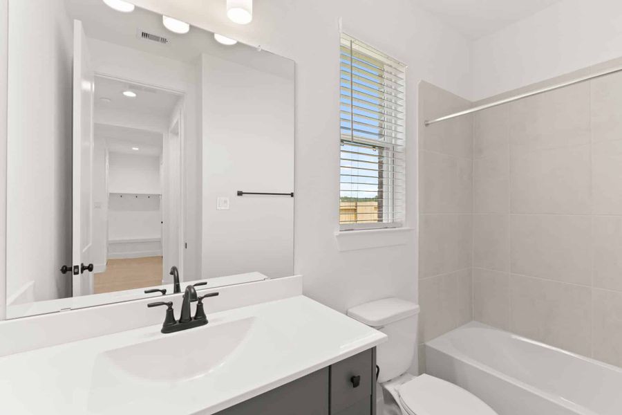 Furnished interior view inside a new home in The Trails, New Caney (Image 7).