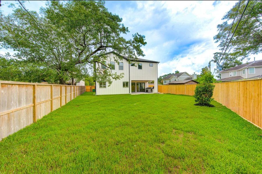 Huge backyard for pool and much more. Fully fenced around for kids' and pets' safety. Solid drain in place.
