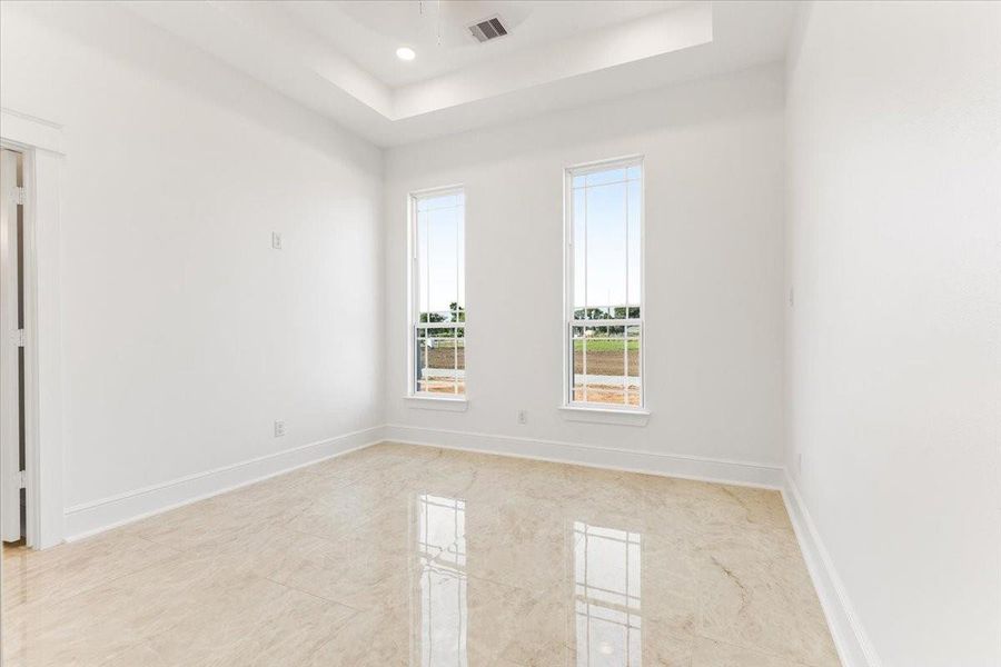 Another view of a bedroom showcasing its bright, open layout and natural light. Another view of a bedroom showcasing its bright, open layout and natural light.