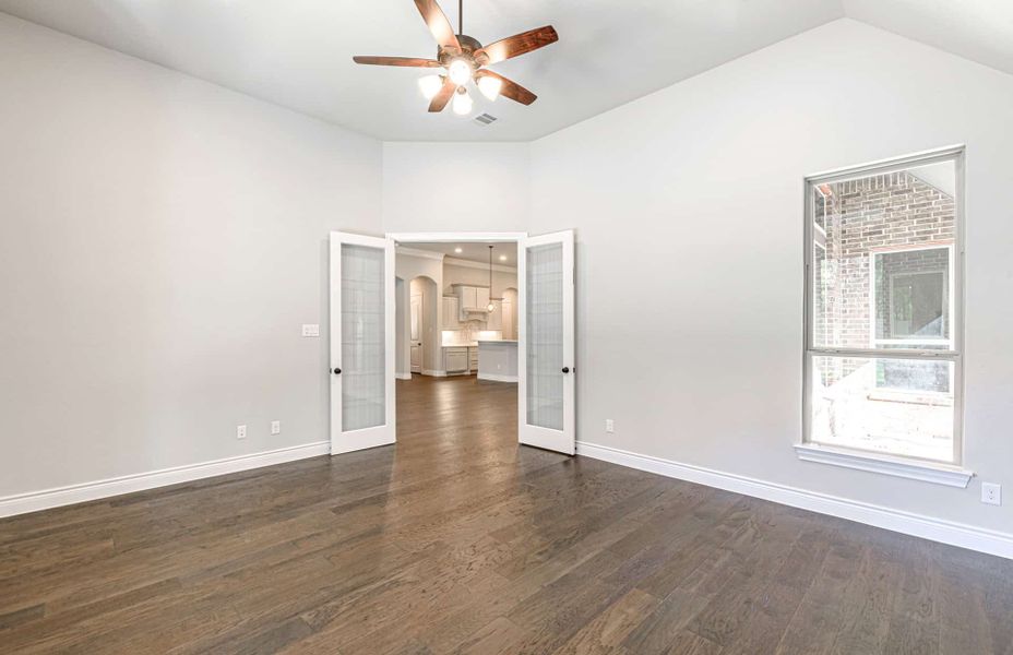 Representative unfurnished interior of a home built from the 3358 by Ravenna Homes in Artavia 70′, Conroe (Image 50).