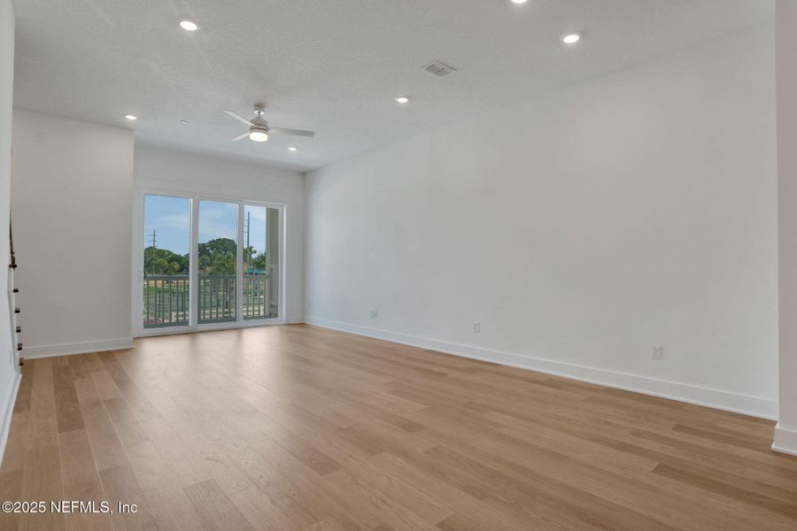 Spacious, unfurnished interior of a new home in North Beach Townhomes, Jacksonville Beach (Image 20).