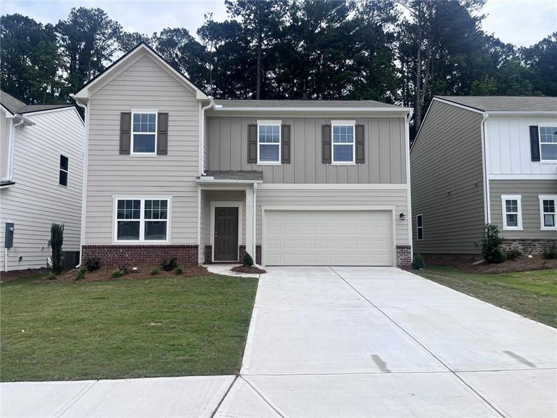 Front exterior of a new home in Casteel, Bethlehem, GA, highlighting curb appeal (Image 1).