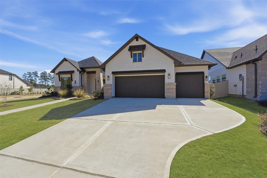 Front exterior of a new home in Audubon 80’s, Magnolia, TX, highlighting curb appeal (Image 18).
