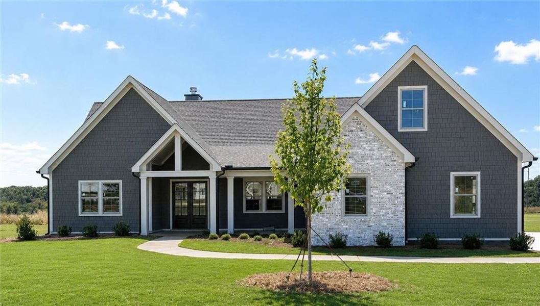 Front exterior of a new home in , Madison, GA, highlighting curb appeal (Image 1). Front exterior of a new home in , Madison, GA, highlighting curb appeal (Image 1).