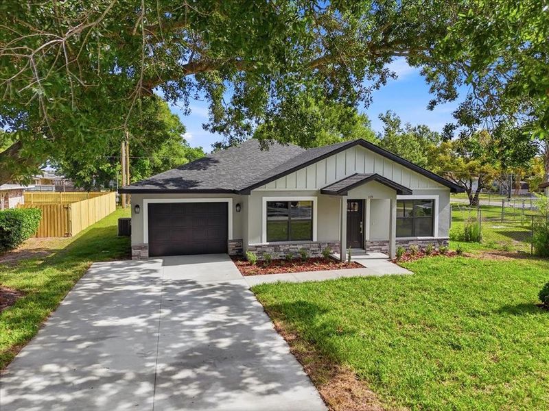 Front exterior of a new home in , Auburndale, FL, highlighting curb appeal (Image 27).