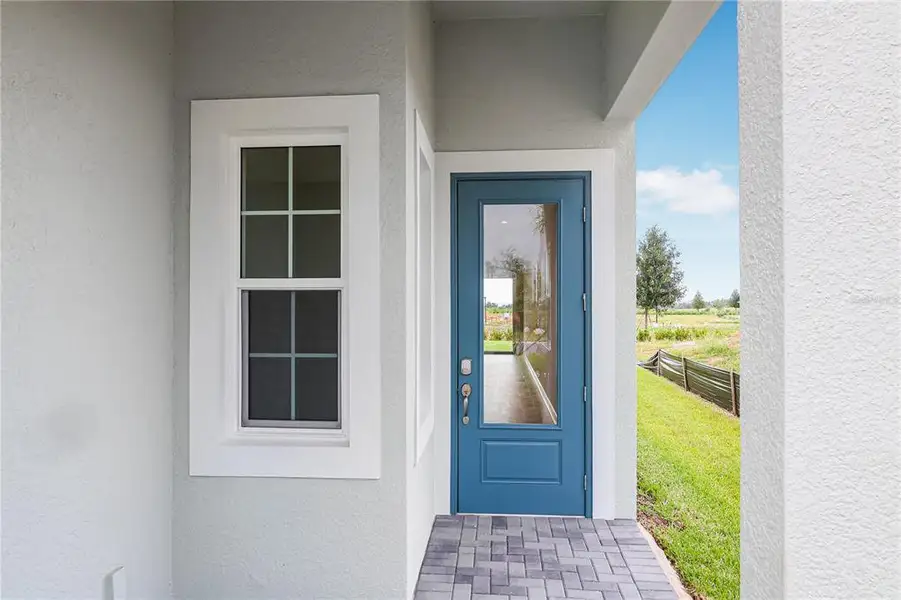 Exterior details and patio area of a home in Cresswind at Lake Harris, Tavares (Image 16).
