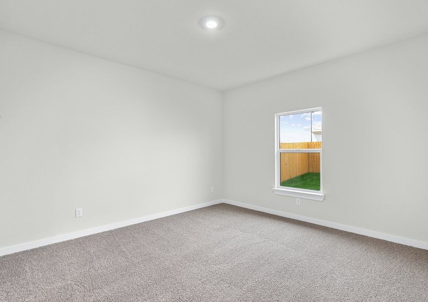 The master bedroom is spacious and has a large window. The master bedroom is spacious and has a large window.