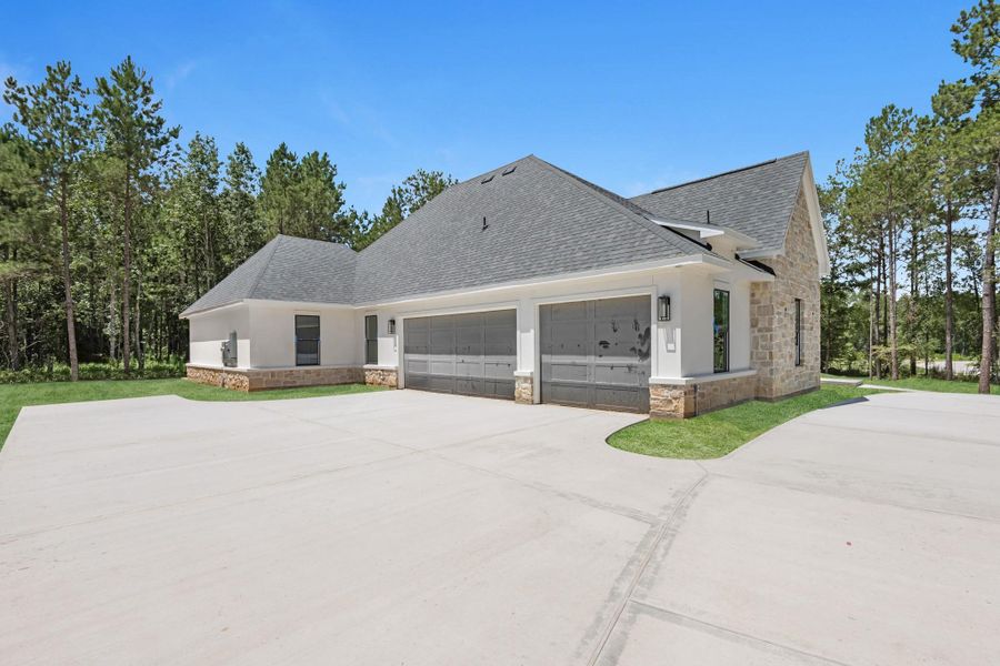Front exterior of a new home in , Montgomery, TX, highlighting curb appeal (Image 2). Front exterior of a new home in , Montgomery, TX, highlighting curb appeal (Image 2).