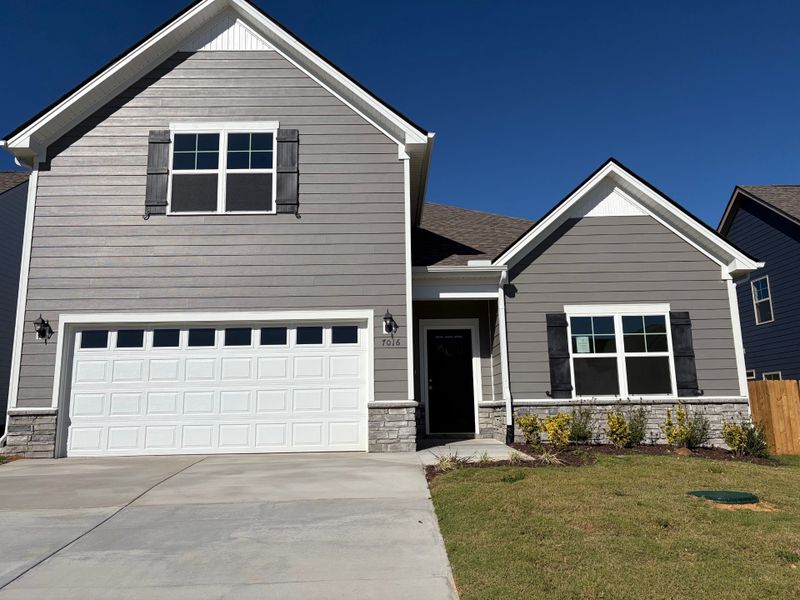 Front exterior of a new home in Cumberland Estates, Fairview, TN, highlighting curb appeal (Image 2).