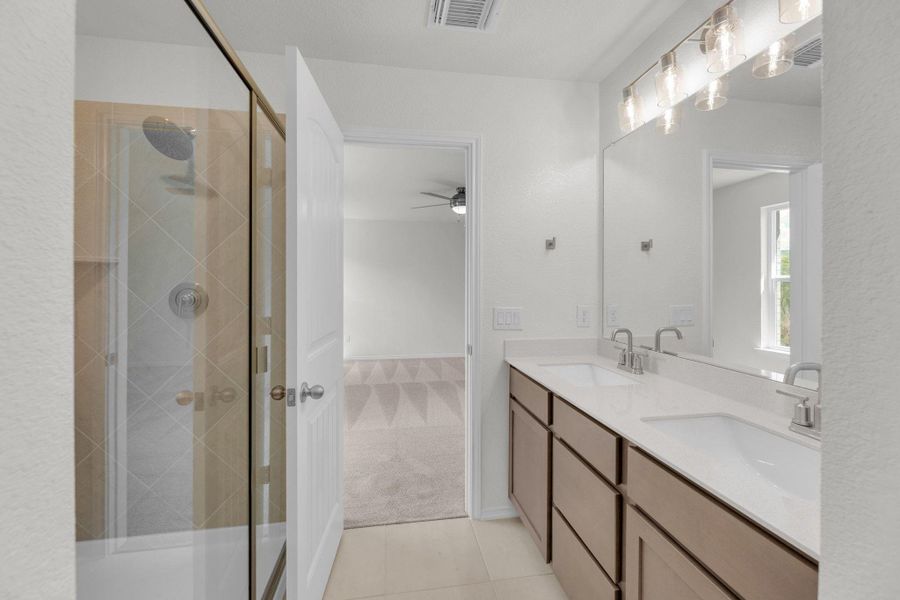 Furnished interior view inside a new home in Mustang Valley, Manor (Image 18).