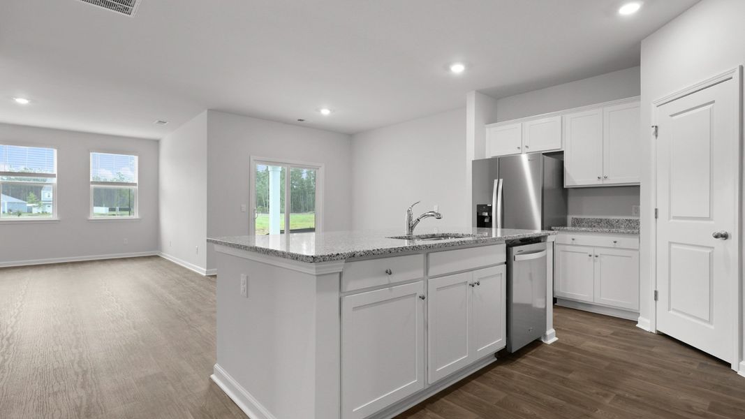 Representative furnished interior of a home built from the ARCHER-EXP by D.R. Horton in Hillcrest, Ravenel (Image 5).