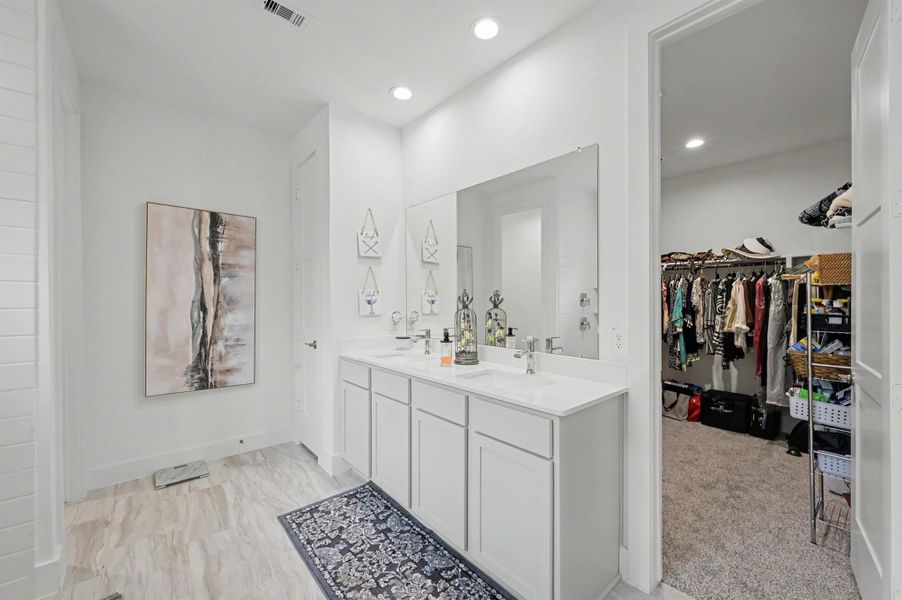 Primary bath en-suite with dual sinks, walk-in-closet, linen closet, toilet room (closed off), and massive super shower - see next pic! Primary bath en-suite with dual sinks, walk-in-closet, linen closet, toilet room (closed off), and massive super shower - see next pic!