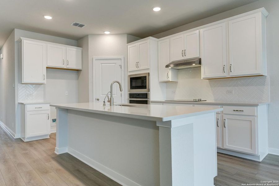 Furnished interior view inside a new home in Saddlebrook Ranch, Schertz (Image 10).