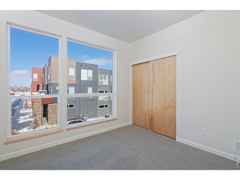Spacious, unfurnished interior of a new home in West Grange, Longmont (Image 11).