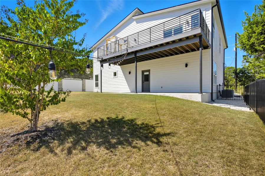 Rear view of property with a patio