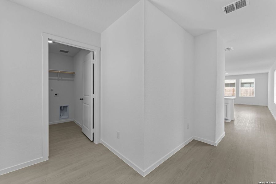 Spacious, unfurnished interior of a new home in Higdon Crossing, San Antonio (Image 12).