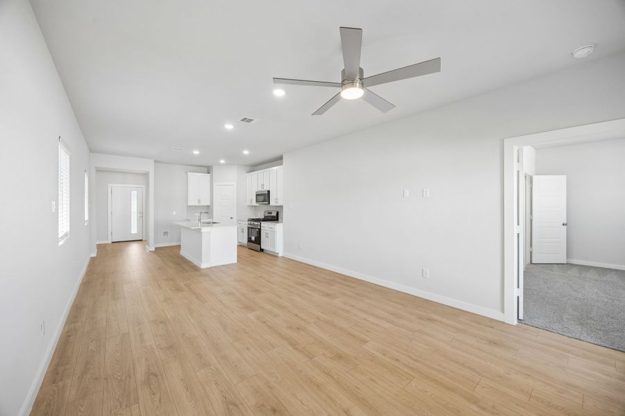 Open Concept in the Birch home plan by Trophy Signature Homes – REPRESENTATIVE PHOTO