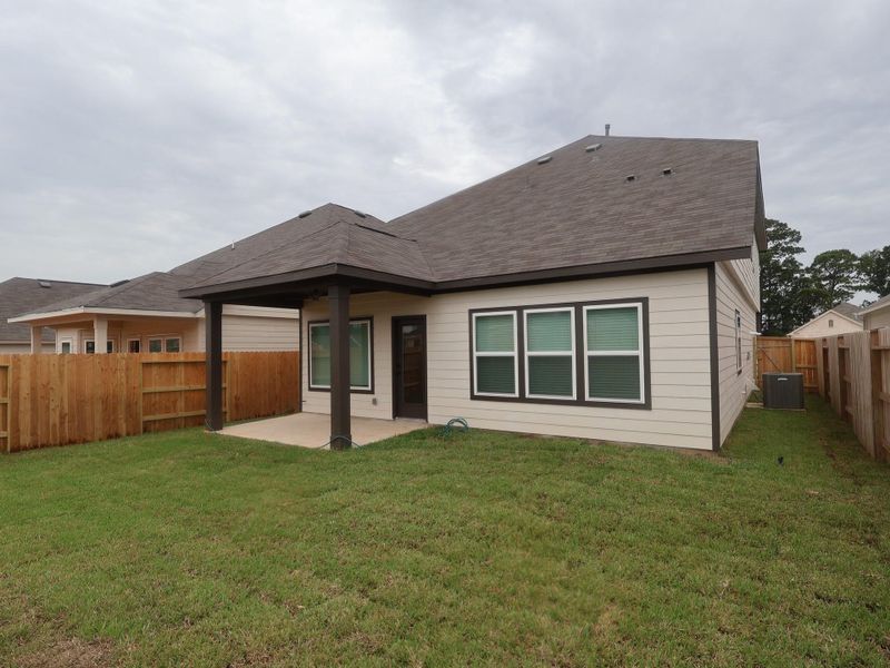 Exterior details and patio area of a home in Lone Star Landing, Montgomery (Image 24). Exterior details and patio area of a home in Lone Star Landing, Montgomery (Image 24).