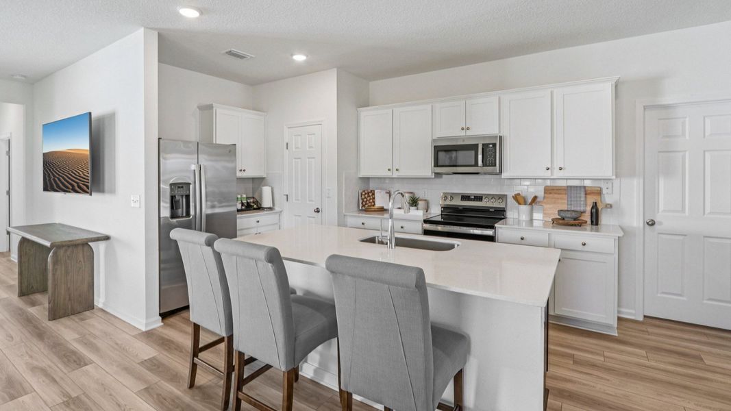 Merritt Floorplan Kitchen by DRB Homes in the Panther Creek Community, Jacksonville, FL