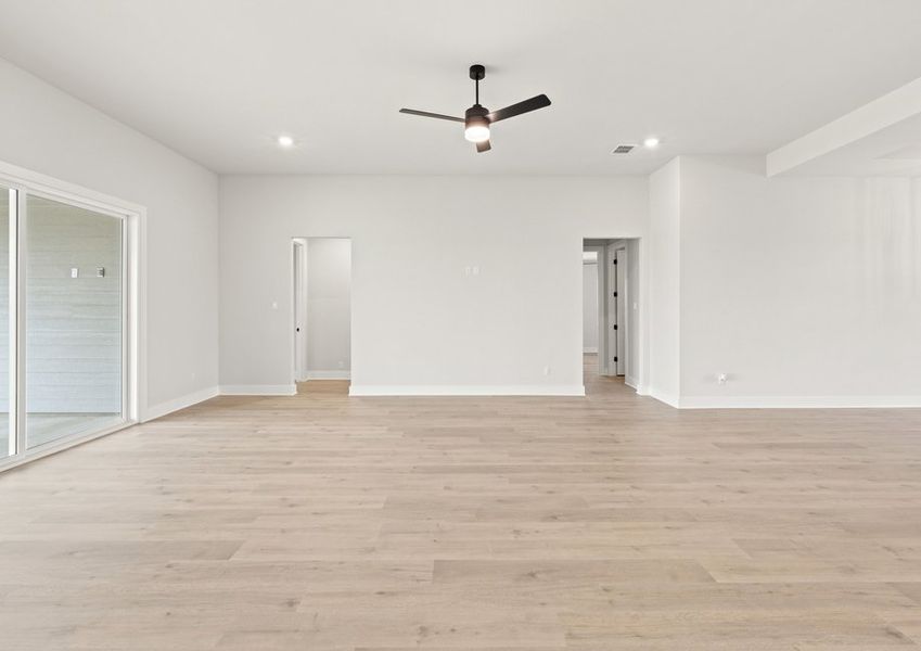 The family room is spacious and has room for everyone to have a seat.