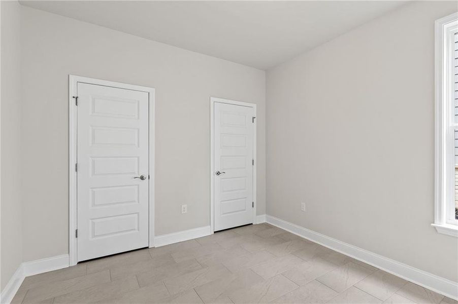 Spacious, unfurnished interior of a new home in Cooper's Walk, Loganville (Image 21).