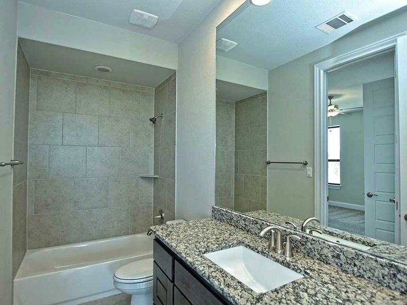 Image 204 representing the Santa Barbara II by Giddens Homes in Scofield Farms Estates, Georgetown, TX.