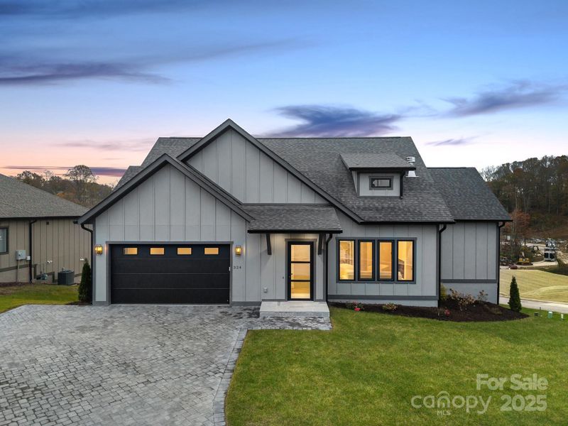 Front exterior of a new home in , Arden, NC, highlighting curb appeal (Image 29). Front exterior of a new home in , Arden, NC, highlighting curb appeal (Image 29).