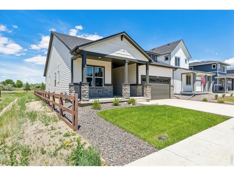 Front exterior of a new home in Country Club Reserve – Fort Collins, Fort Collins, CO, highlighting curb appeal (Image 2). Front exterior of a new home in Country Club Reserve – Fort Collins, Fort Collins, CO, highlighting curb appeal (Image 2).