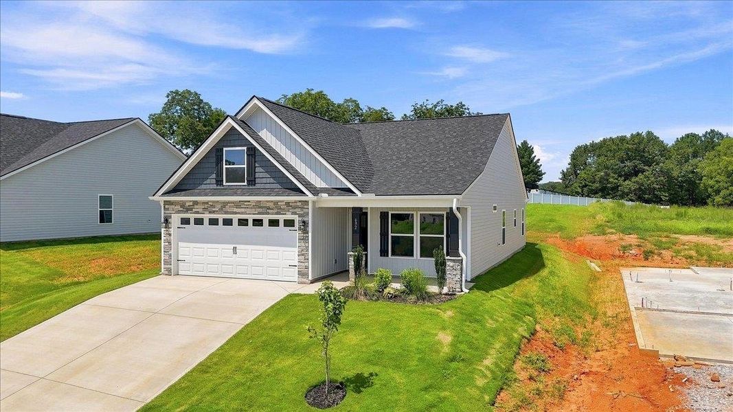 Front exterior of a new home in Davis Heights, Inman, SC, highlighting curb appeal (Image 23).