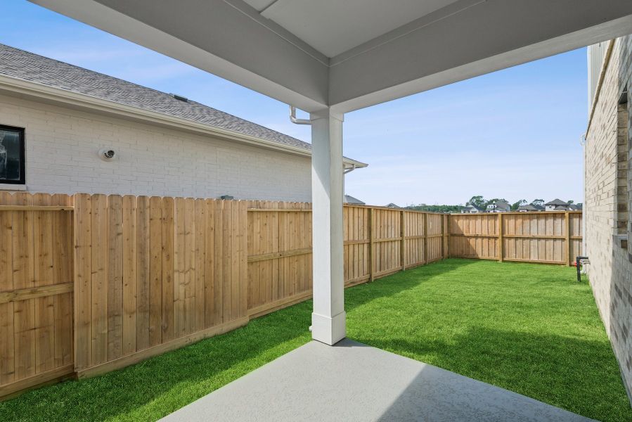 Exterior details and patio area of a home in Riceland - Enclave Row Collection, Mont Belvieu (Image 3).