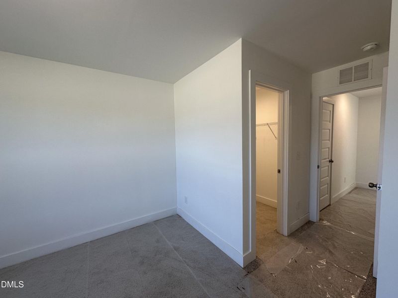 Secondary Bedroom with walk in closet Secondary Bedroom with walk in closet